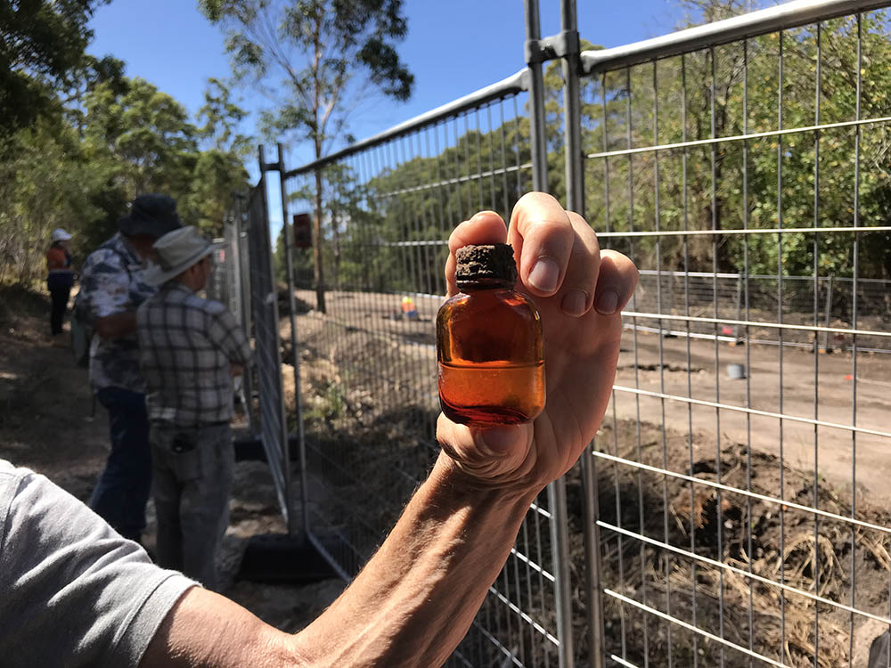Bottle containing liquid - "Hollywood" Jesmond NSW Archaeological Site Visit 24 February 2023