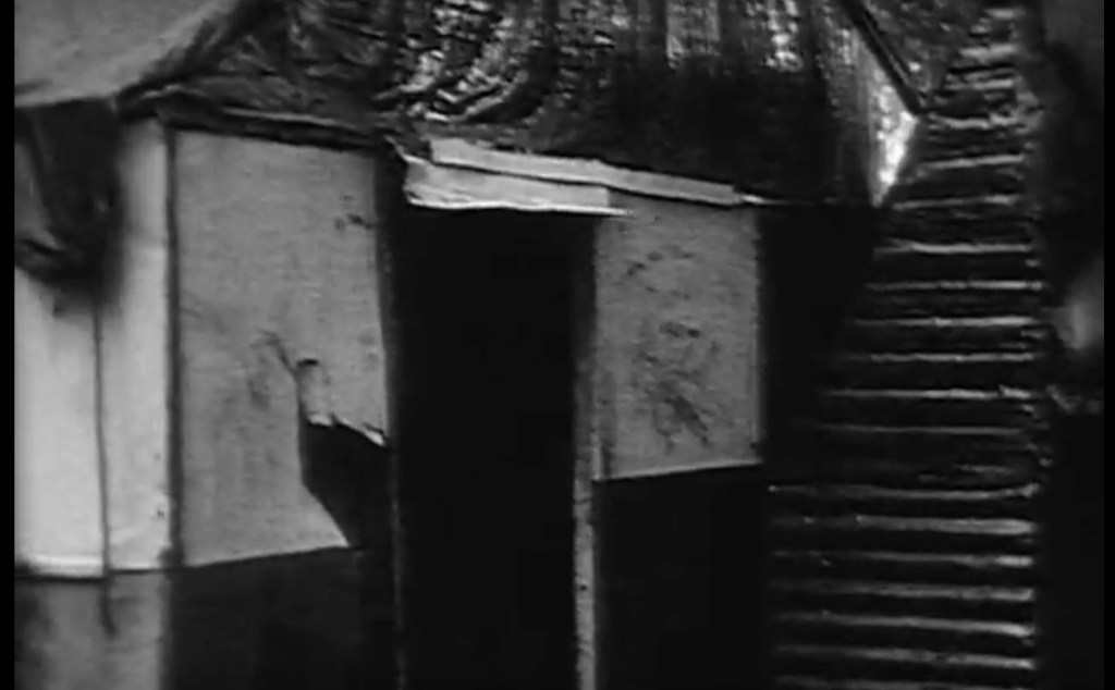 Dwelling of little boy who was playing with toy pistol in doorway - from NBN News Film AF7-AF9 circa April-May 1963.