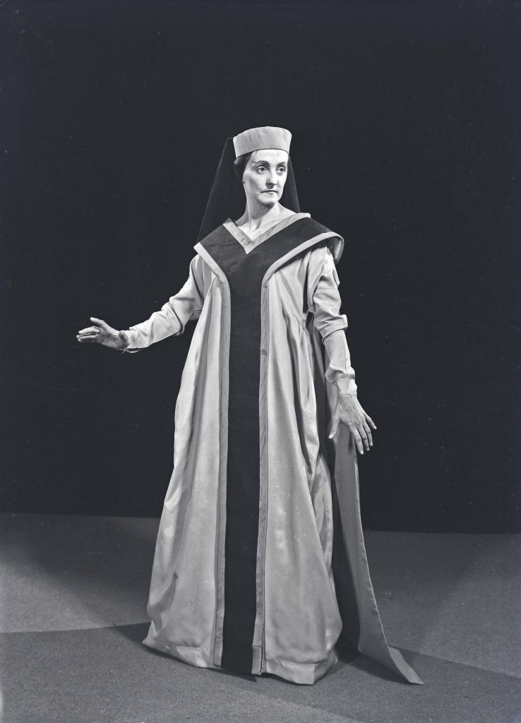 Woman in dress and head dress theatrical setting. Joyce Williams as Lady Macbeth, 1961. Hannan Photographic Archive [AHAN00476]