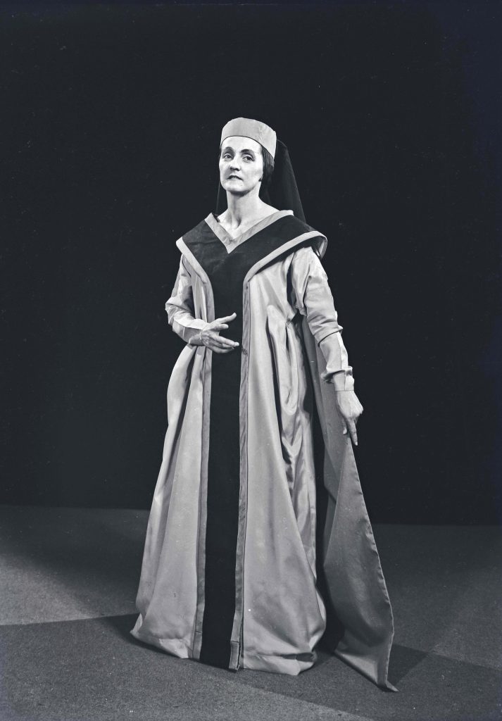 Woman in head dress theatrical setting. Joyce Williams as Lady Macbeth. June/July, 1961. [Hannan Archive AHAN00477]