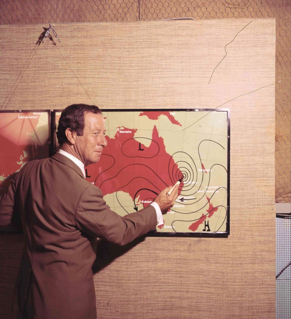 Des Hart, one of the first professional meteorologists to be employed to present the weather on the News Broadcasts, photographed in NBN Studio B in 1977 (Courtesy NBN Archive)