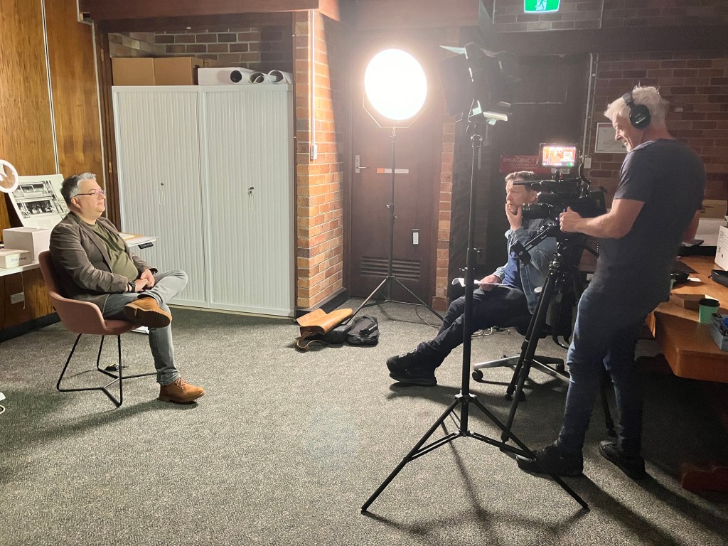 Chit Chat & Tony filming University of Newcastle's Dr Amir Moghadam, Conservator of the Ralph Snowball Glass Negatives.