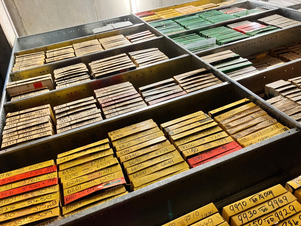 Looking up the shelves to the Hannan Archive boxes