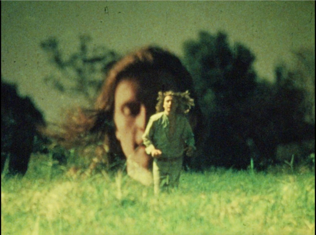 Jim Beiers running in a scene from the experimental film Box (1971)