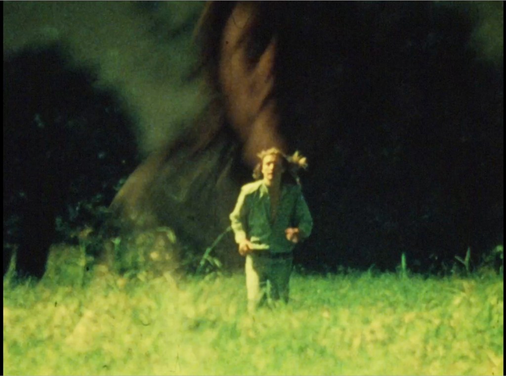 Jim Beiers running in a scene from the experimental film Box (1971)