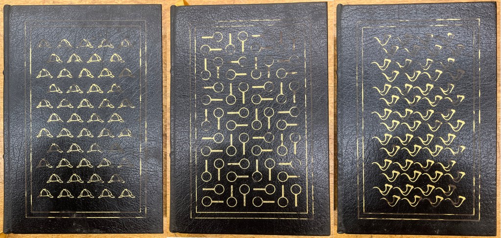 Motif Decorations of deerstalkers, magnifying glasses and pipes adorn the leather bound volumes.
