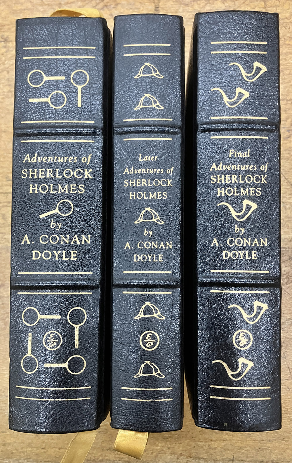Three volumes of Sir Arthur Conan Doyle Sherlock Holmes stories donatd by Dr Lionel Fredman in August 2003.