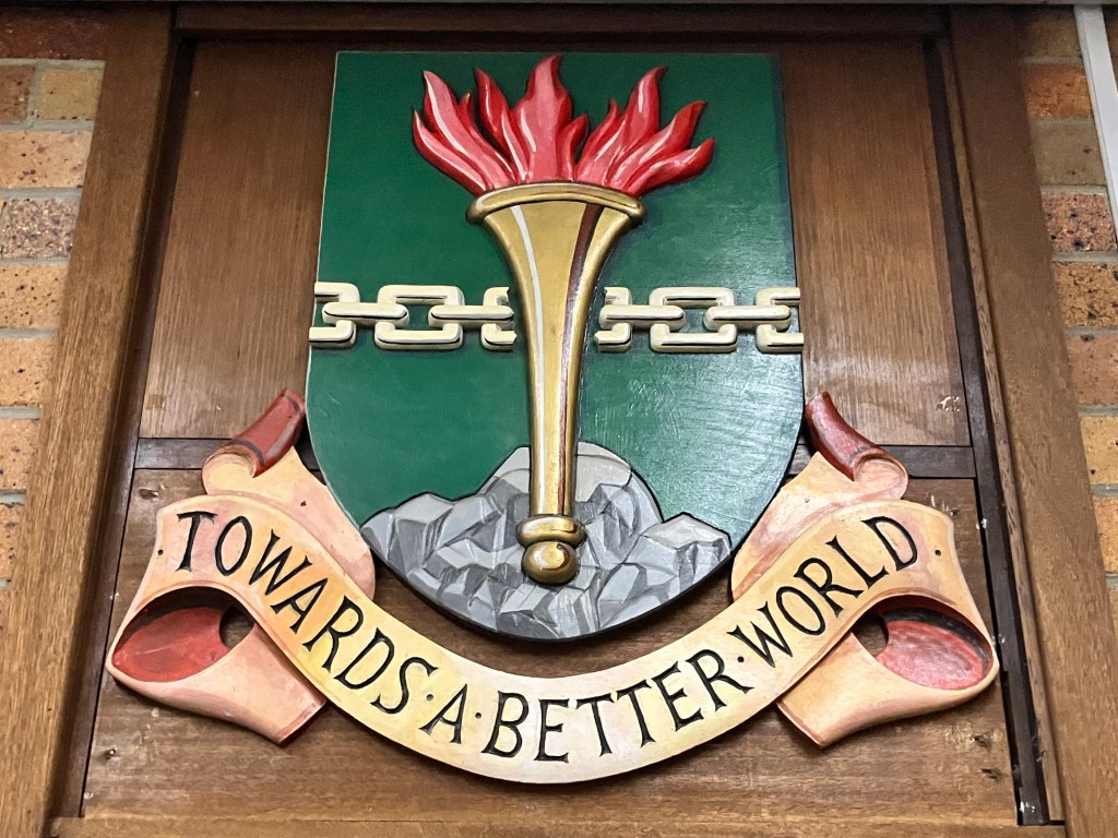 Newcastle Teachers' College Motto Ad Meliorem Mundum Translated "Towards a Better World"