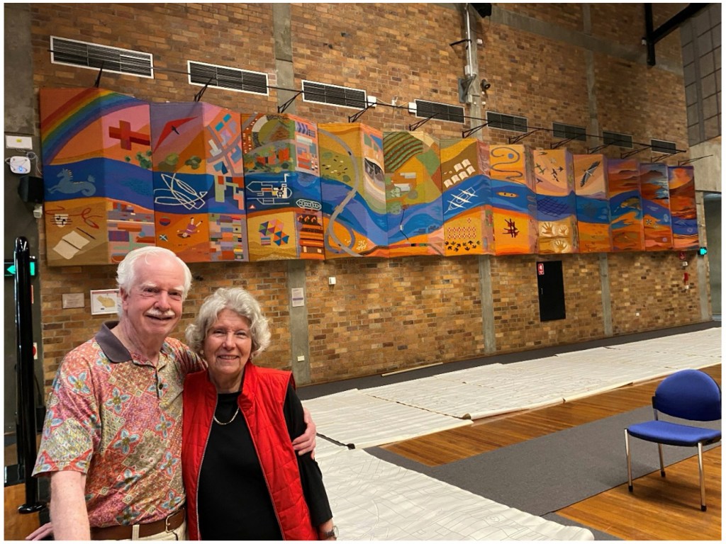 Richard Beeston, with Lesley Gent of the Friends of the University with the Hunter Tapestry and cartoons, Great Hall, 30 September 2025.