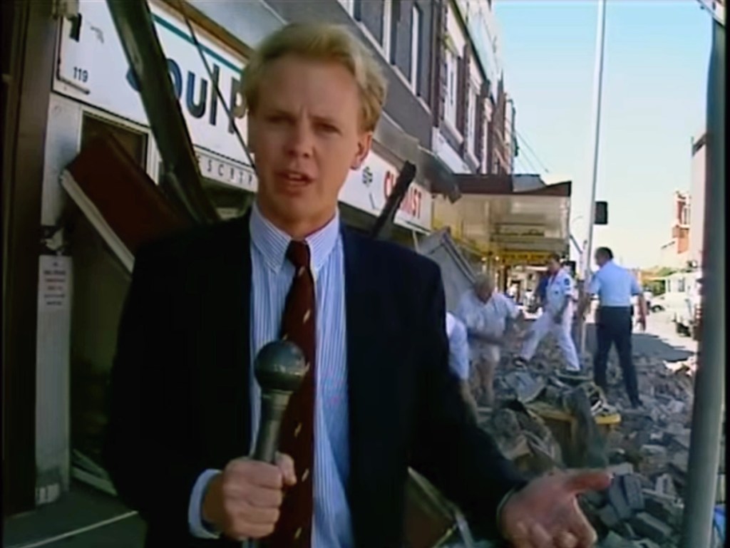 NBN Reporter Ross Hampton with with Stuart Osland behind the camera in Beaumont Street, Hamiton 28 December 1989, just after the Newcastle Earthquake.