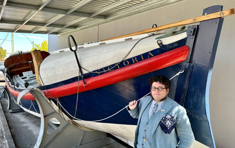 David Hampton, Curator of the Newcastle Museum, with Lifeboat 'Victoria II'.